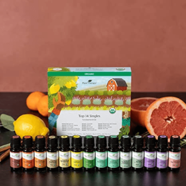 Plant Therapy Top 14 Organic Essential Oil Singles Set with oranges and grapefruits.