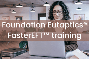 A woman working on a laptop with the words foundation eutaptics fasterft training.