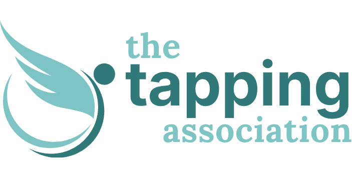 Logo for "The Tapping Association" featuring stylized gold and green wings and text.